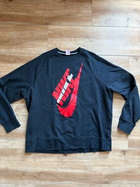 Nike Black Crewneck with Red and White Swoosh Graphic